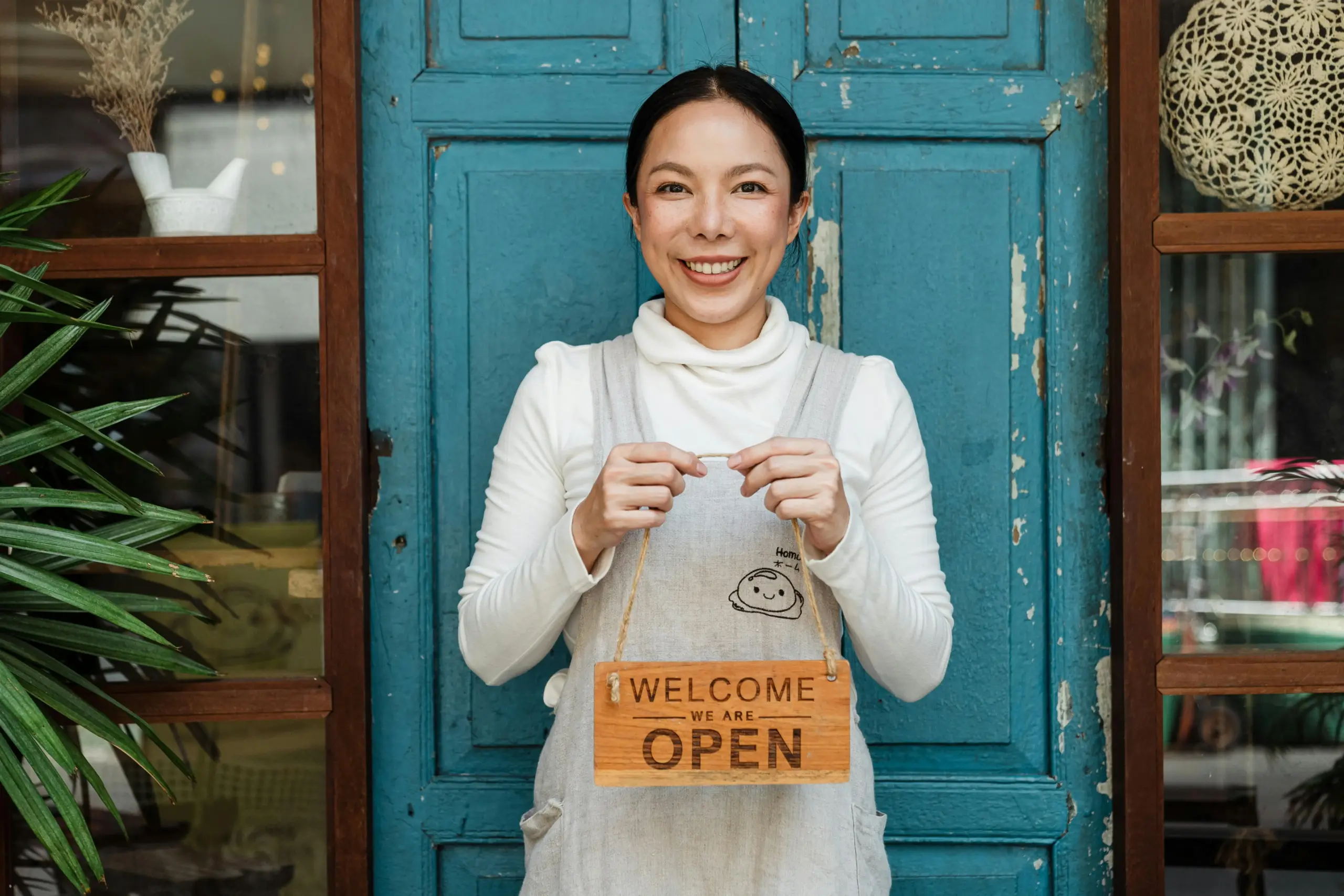 Business Woman with Sign - by Ketut Subiyanto on Pexels.com